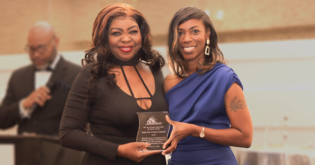 Chandra Mathews-Smith accepts the Community Partnership Award at Guiding Light Mentoring's Igniting Future Leaders Gala on Oct. 21, 2022 