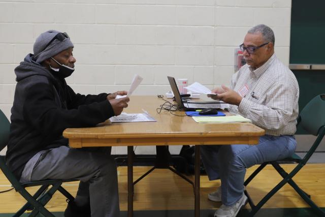 Dayle Newman (left) and volunteer Kenneth Bibb