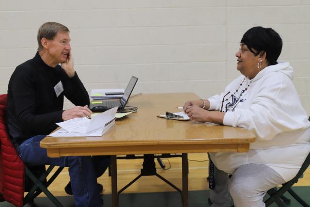 Volunteer Doug Becker (left) and Schone Walker 